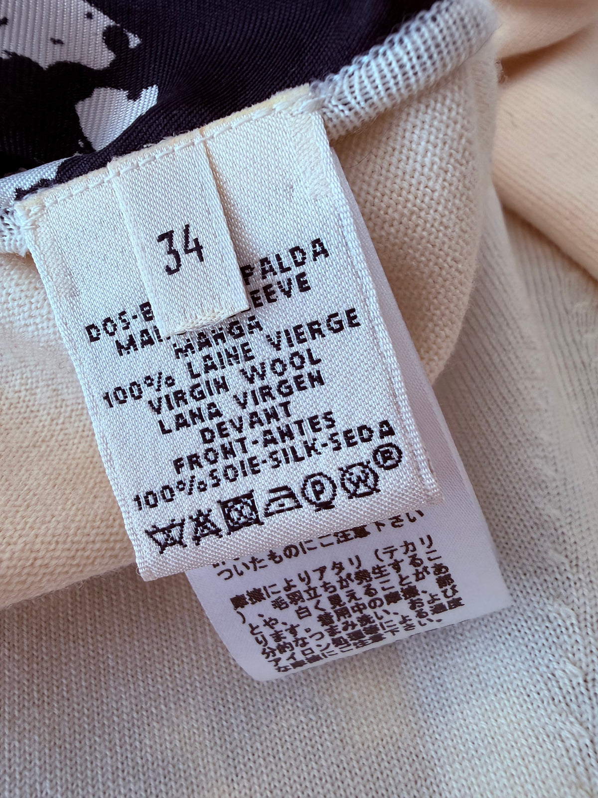 Hermès size 34 fabric tag showing 100% virgin wool and 100% silk
