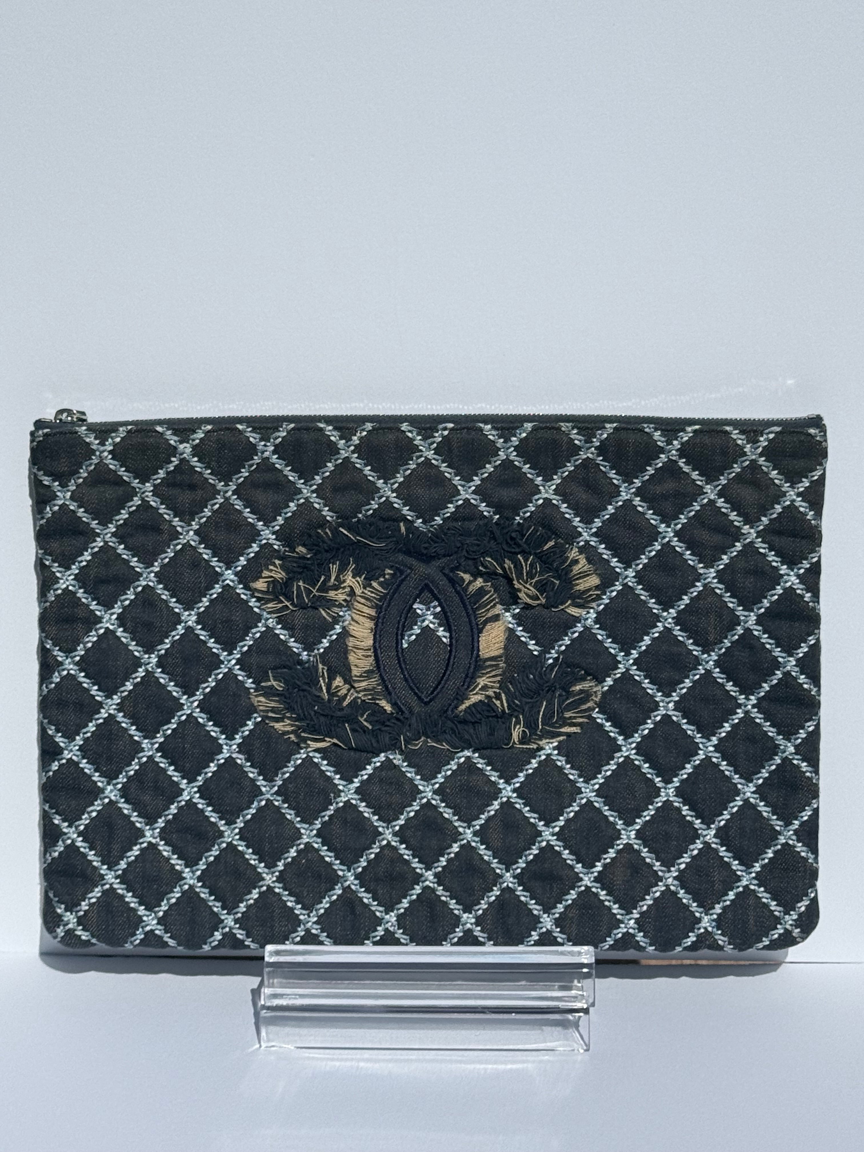 Chanel Quilted Denim Large O-Case Clutch — Dark Blue with CC Fringe