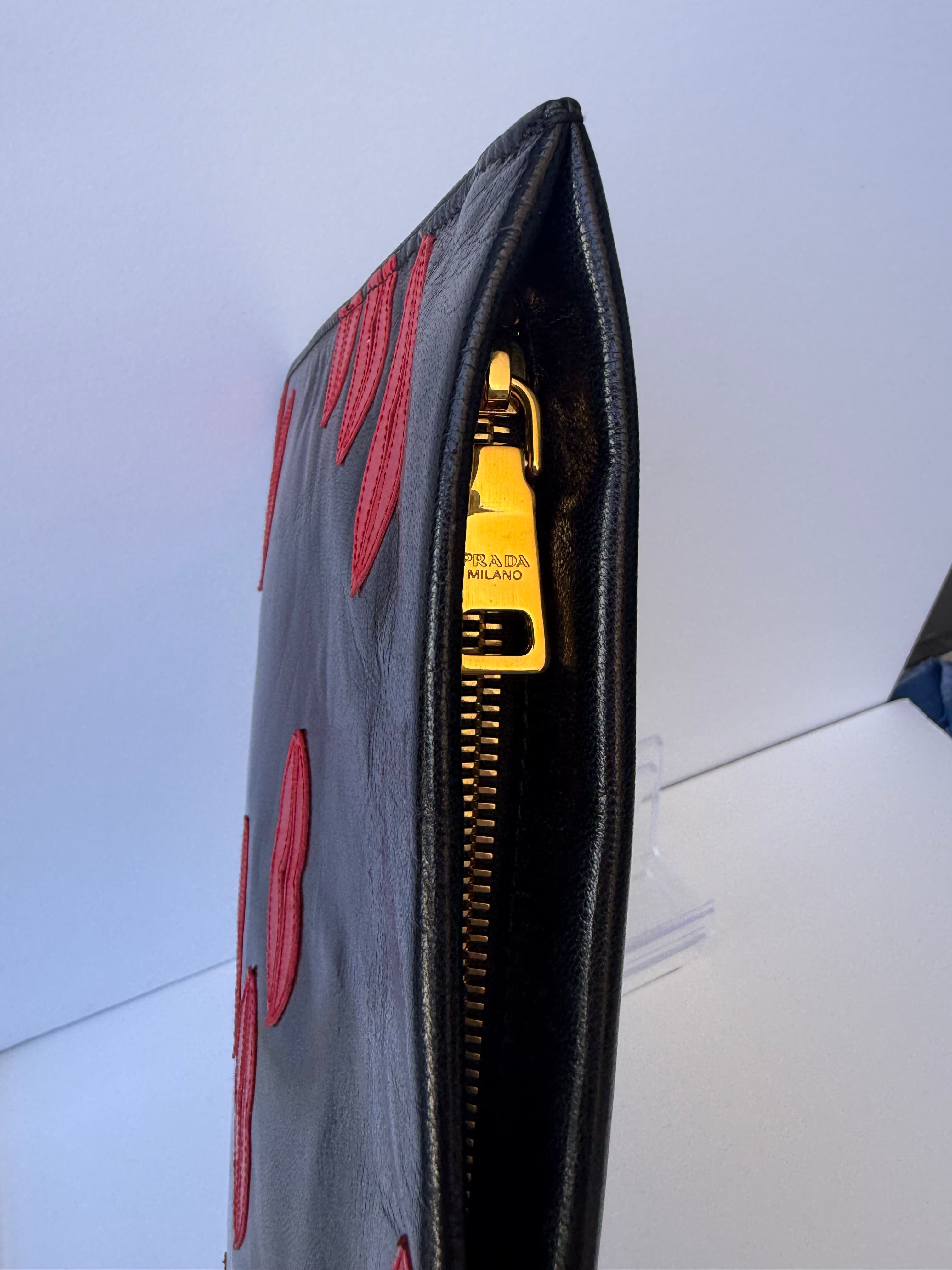 Prada Black Leather Clutch with Red Lip Appliqué