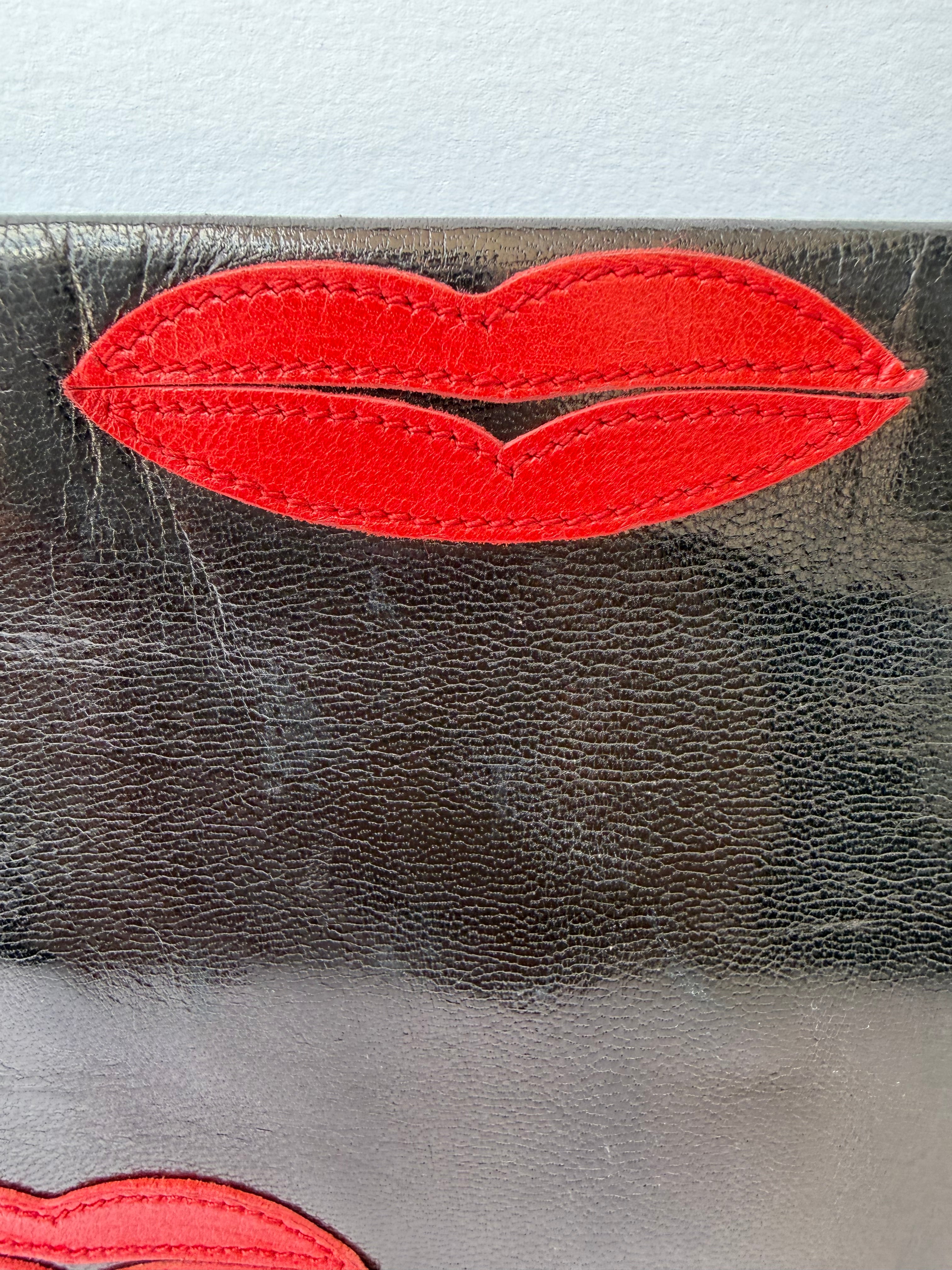 Prada Black Leather Clutch with Red Lip Appliqué
