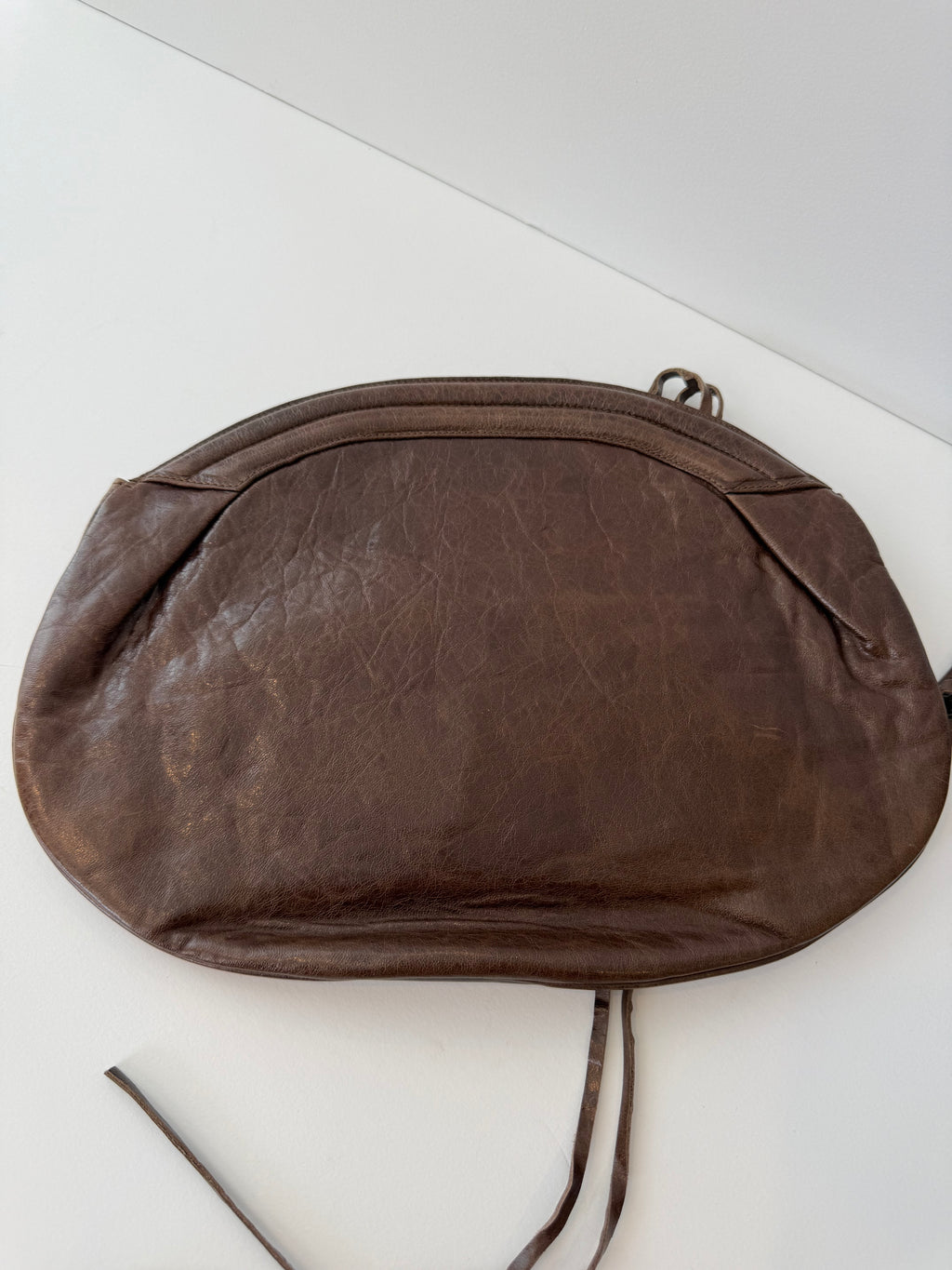 Balenciaga Classic Hardware Oval Clutch in Truffle Chèvre Leather